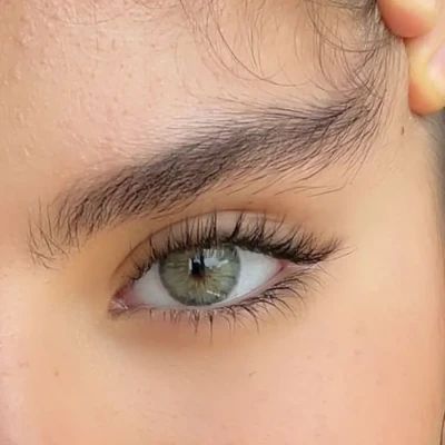 لنز رنگی سلنا طوسی‌ سبز کلوپاترا گری ماهانه